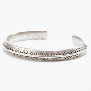round silver bracelet with circles pattern